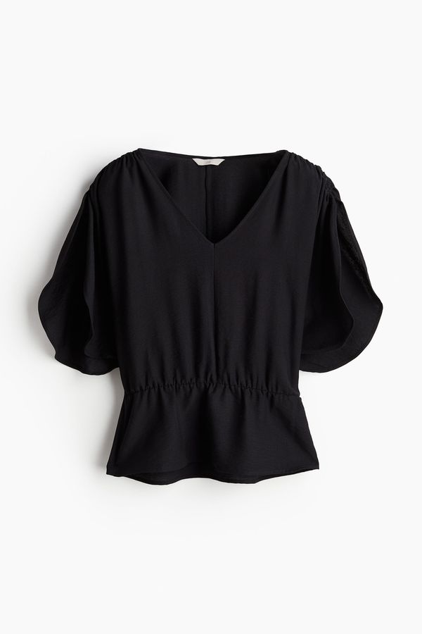 Blusa con detalle de cordón de ajuste