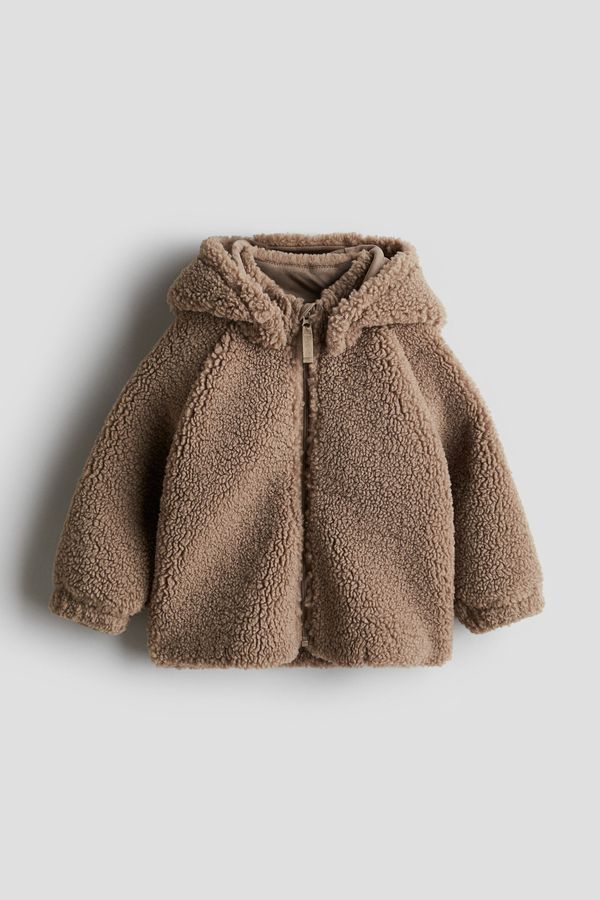 Chaqueta en peluche con capucha