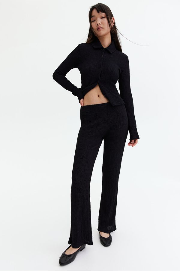 Flared textured trousers