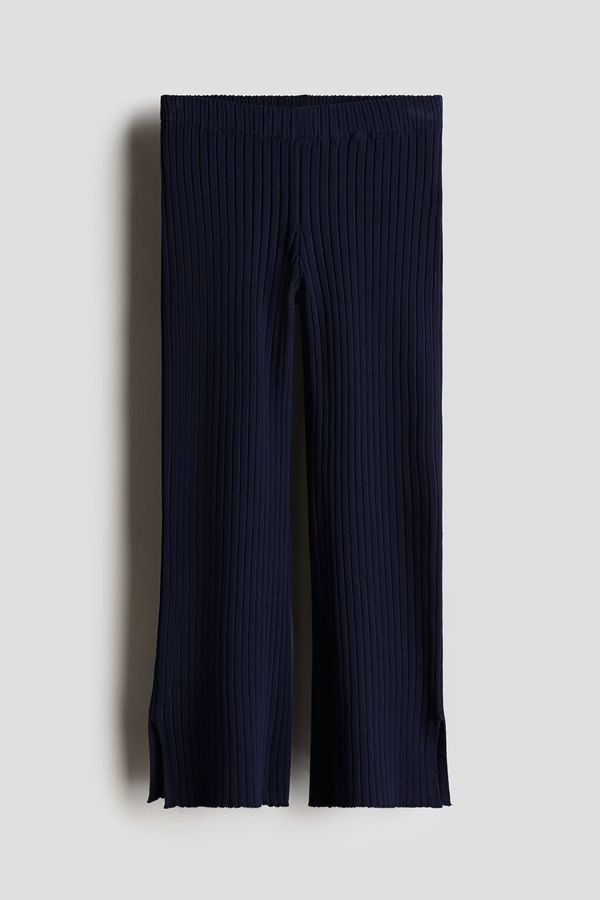 Pantalón bota campana en tejido acanalado