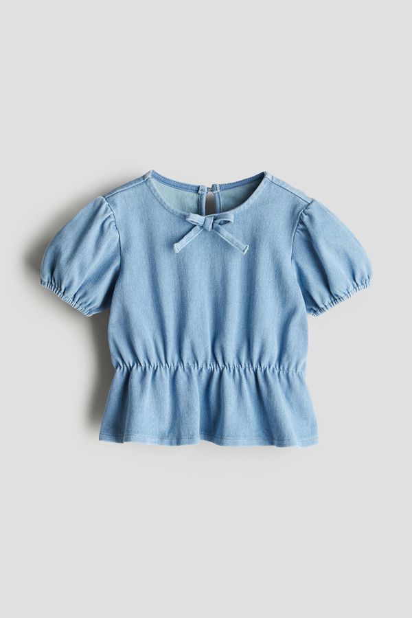 Blusa efecto denim con peplum