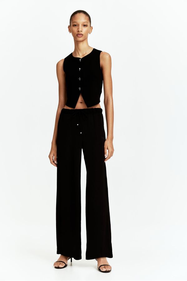 Chaleco cropped en punto
