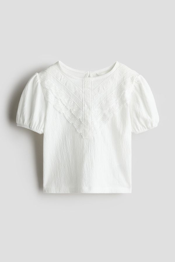 Blusa de algodón con detalles de encaje