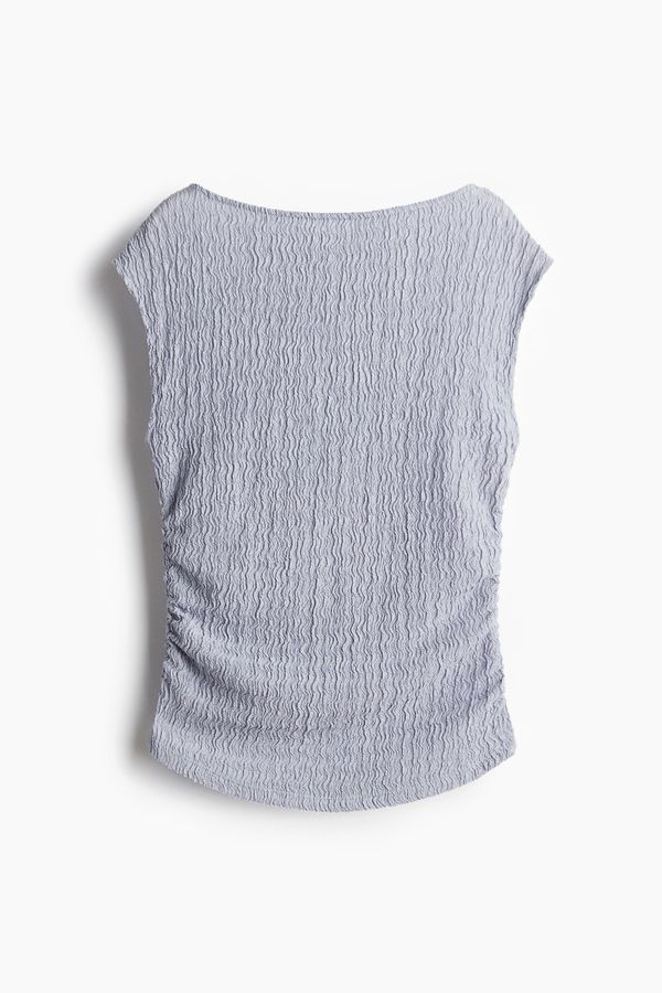 Blusa en punto con textura