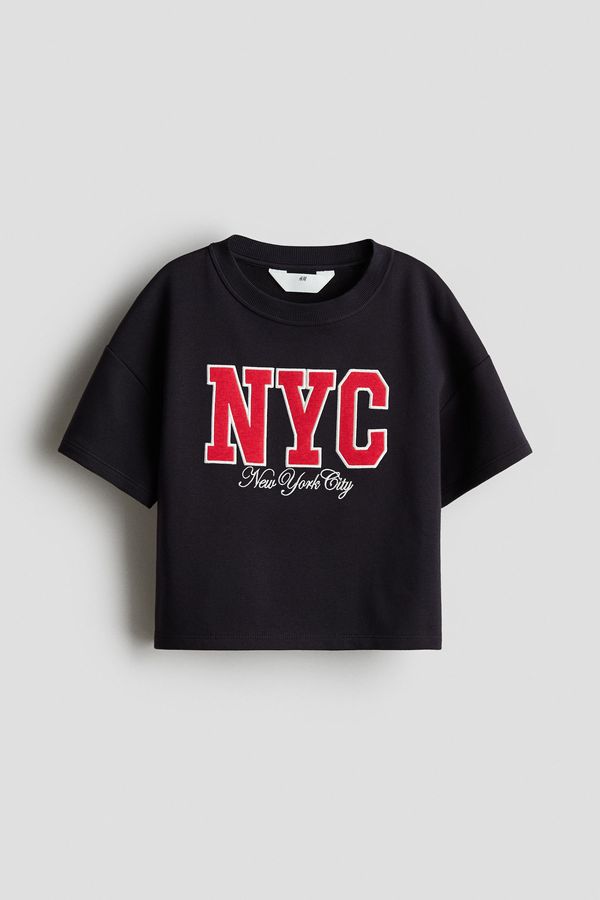 Camiseta corta con motivo estampado
