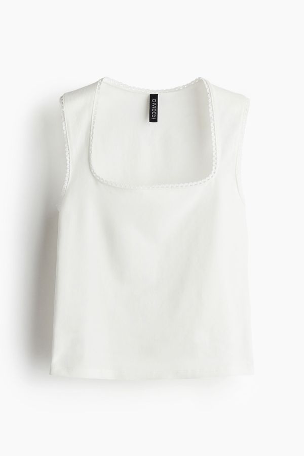 Camiseta manga sisa con ribete de picot