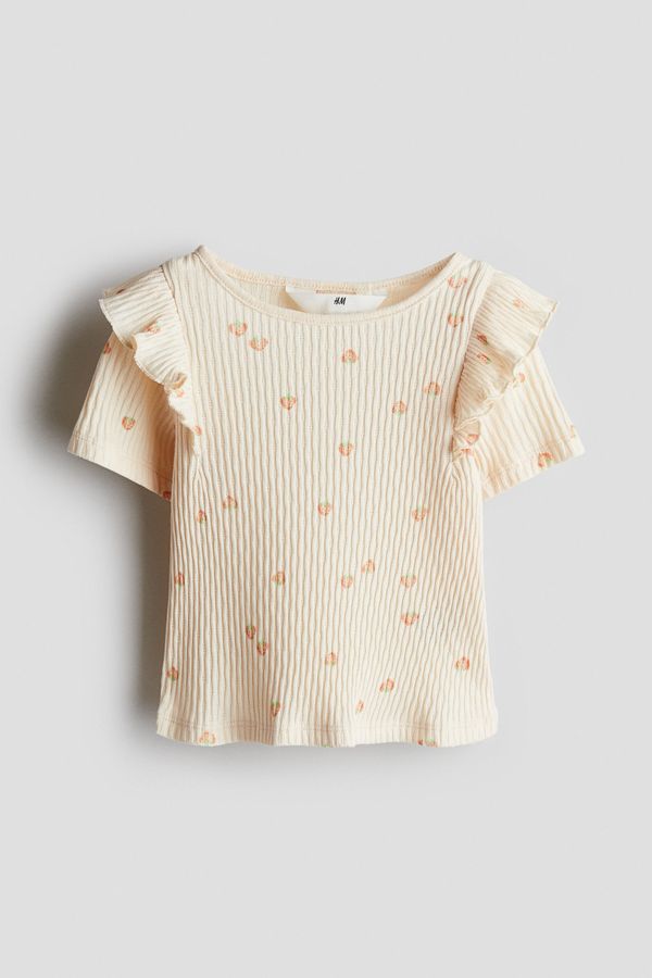 Blusa en algodón con volantes