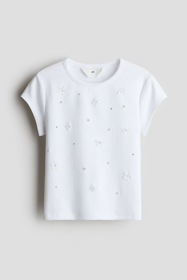 Camiseta en algodón con detalles decorativos