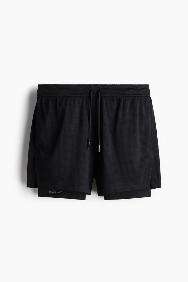 Shorts a media pierna 2 en 1 con DryMove™