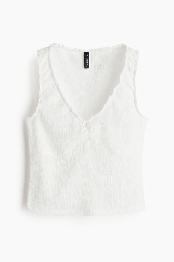 Camiseta manga sisa en punto efecto arrugado