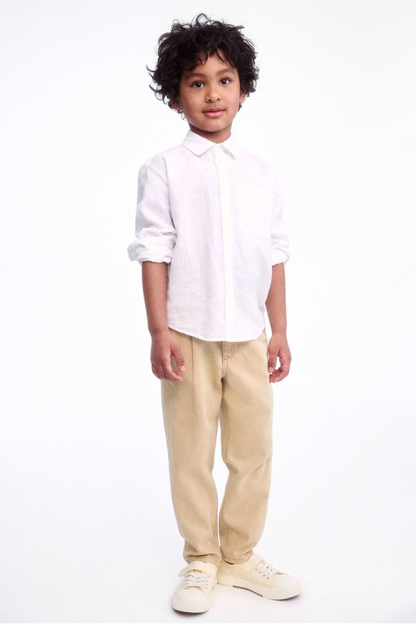 Pantalón de corte holgado en sarga