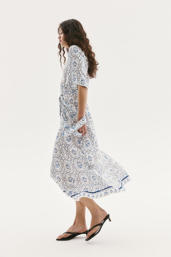 Vestido camisero con cinturón de anudar
