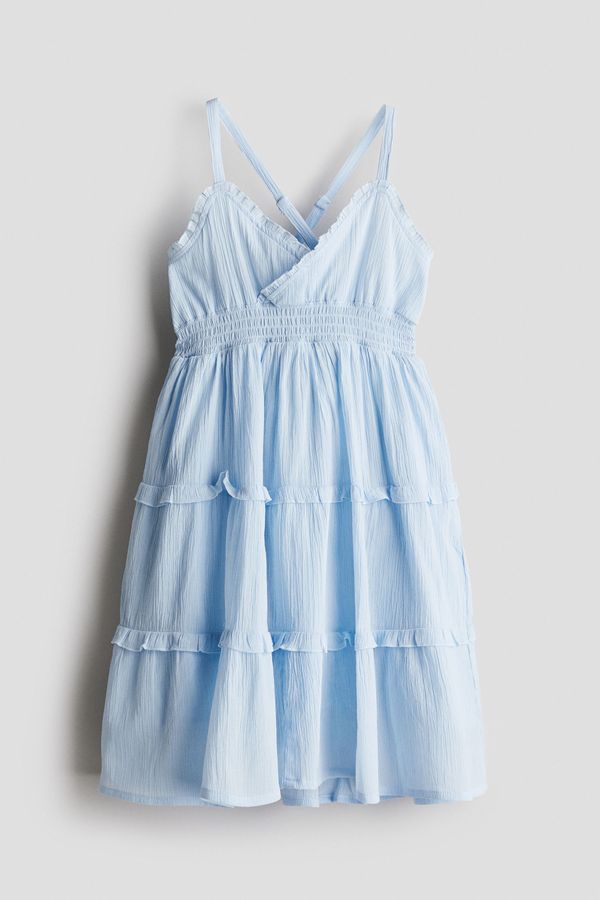 Vestido enresortado con volantes