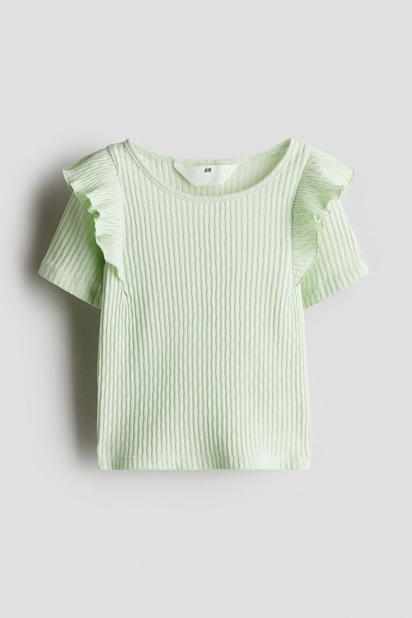 Blusa en algodón con volantes