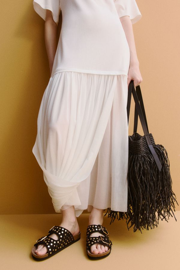 Sandalias con taches