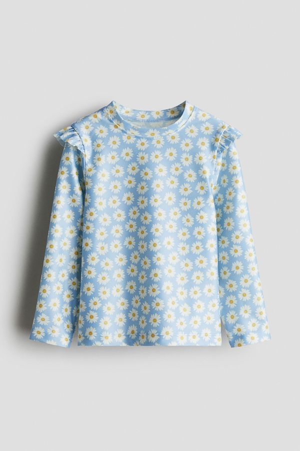 Camiseta de baño UPF 50 con volantes
