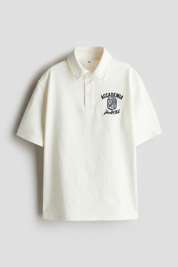 Camiseta estilo polo con motivo de texto