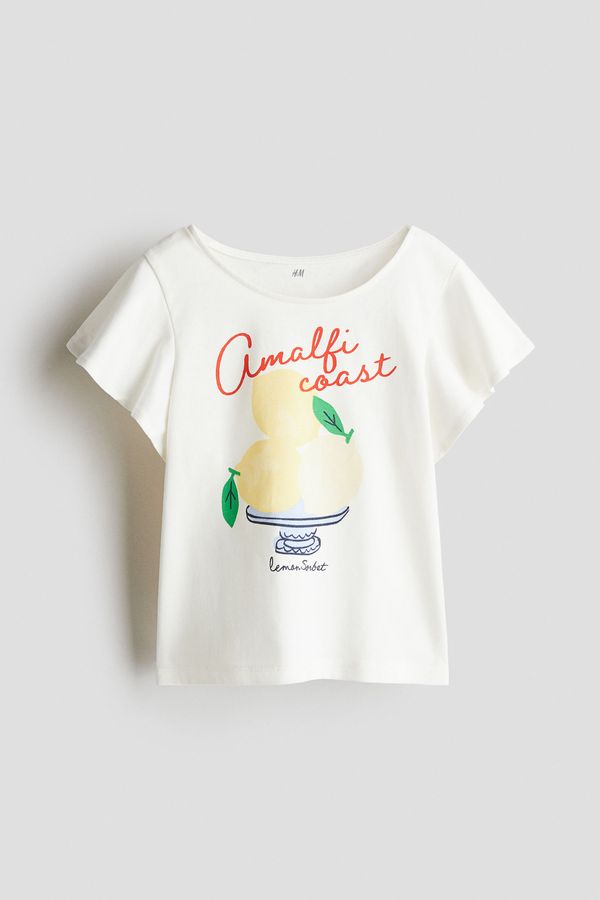 Camiseta en algodón con manga de volante