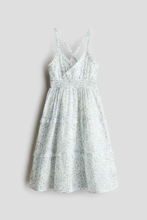 Vestido enresortado con volantes