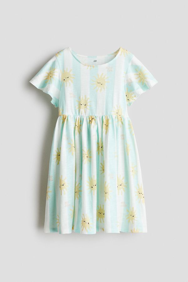 Vestido de algodón con manga sisa con volante