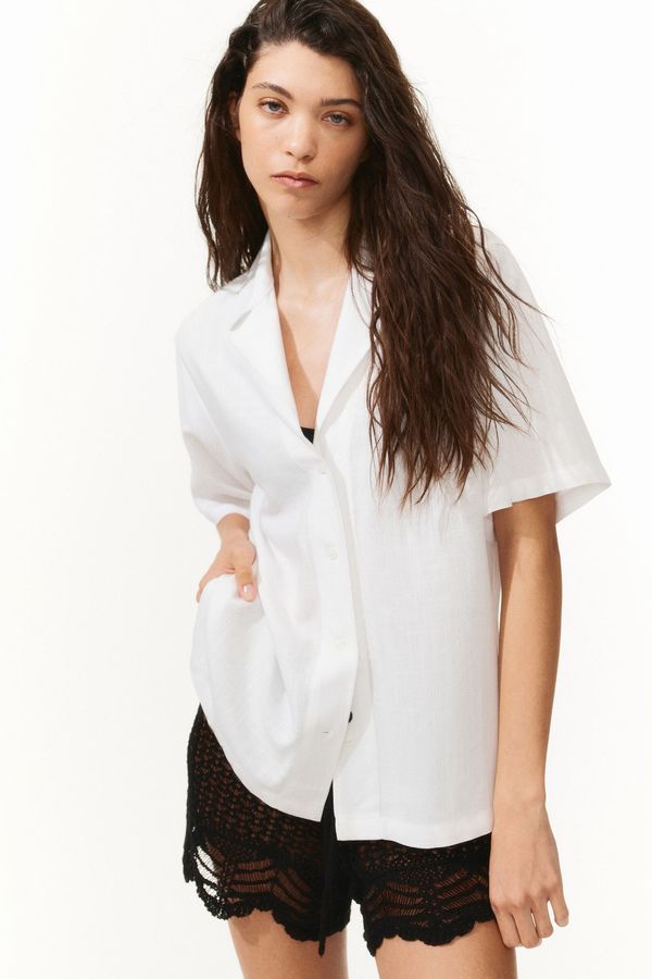 Camisa resort holgada