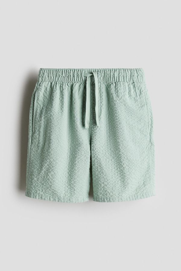 Shorts en sirsaca de algodón