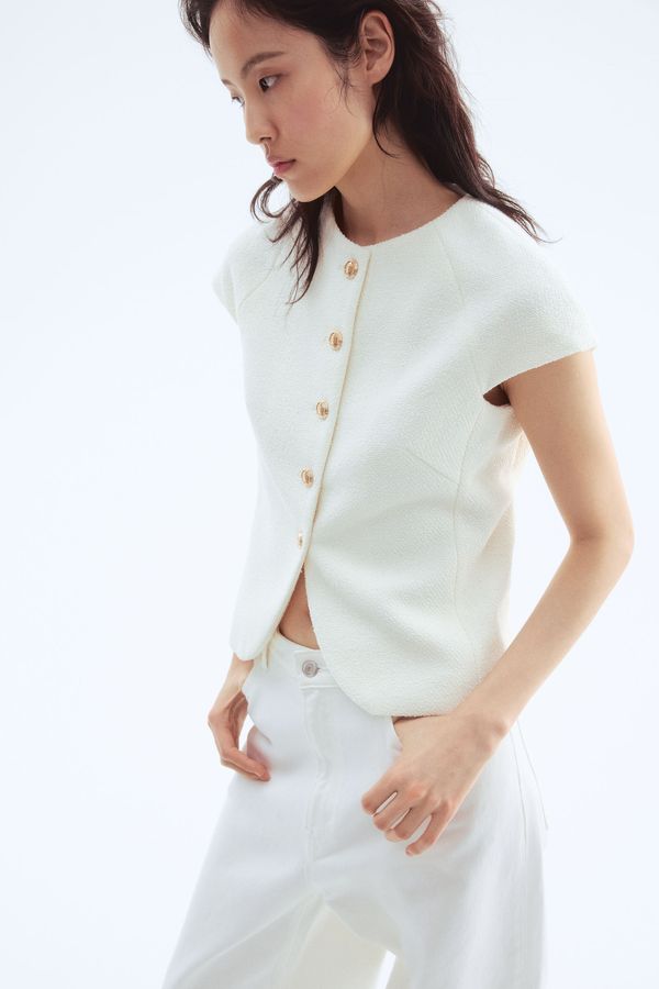 Blusa con botones delante