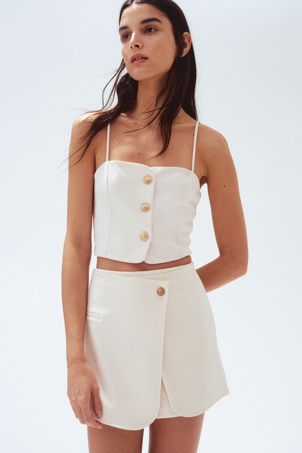 Falda short interlock