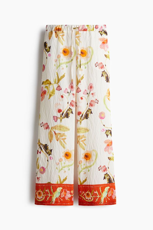 Pantalón ancho con cordón de ajuste