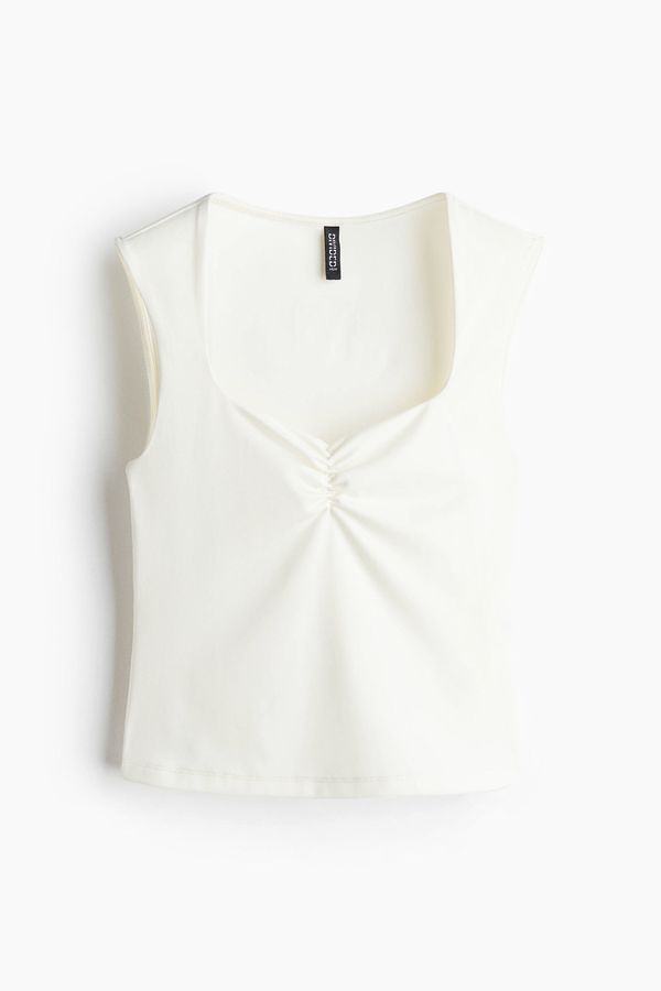 Blusa manga sisa con recogido