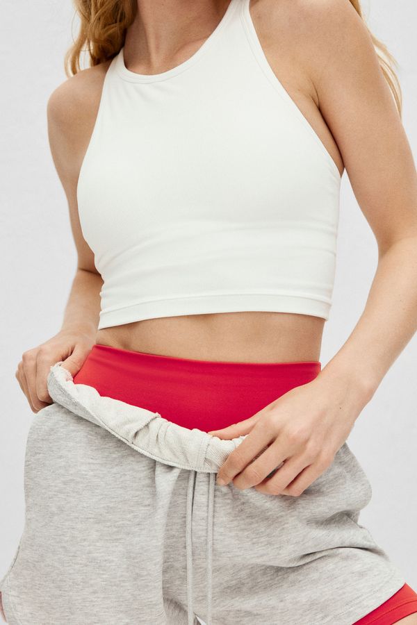 Top sostén de deporte con DryMove™ Medium Support