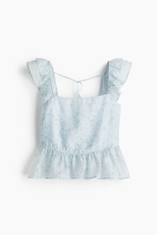 Blusa con lazada y peplum