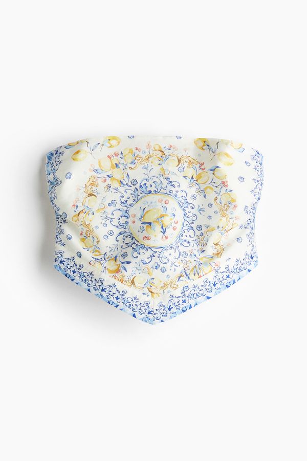 Top bandeau con lazada detrás