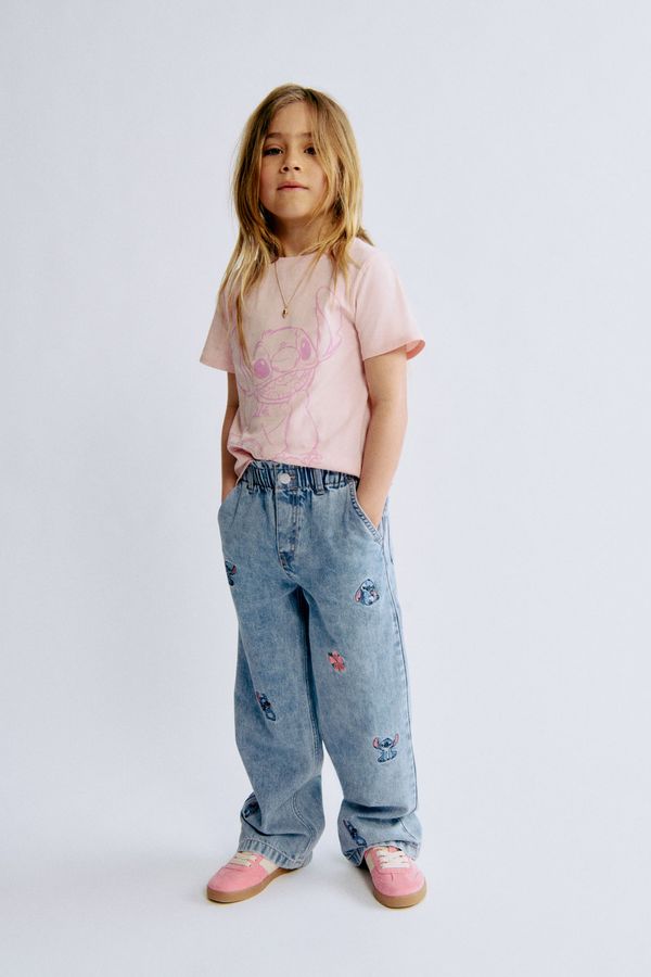 Jeans anchos con motivos decorativos