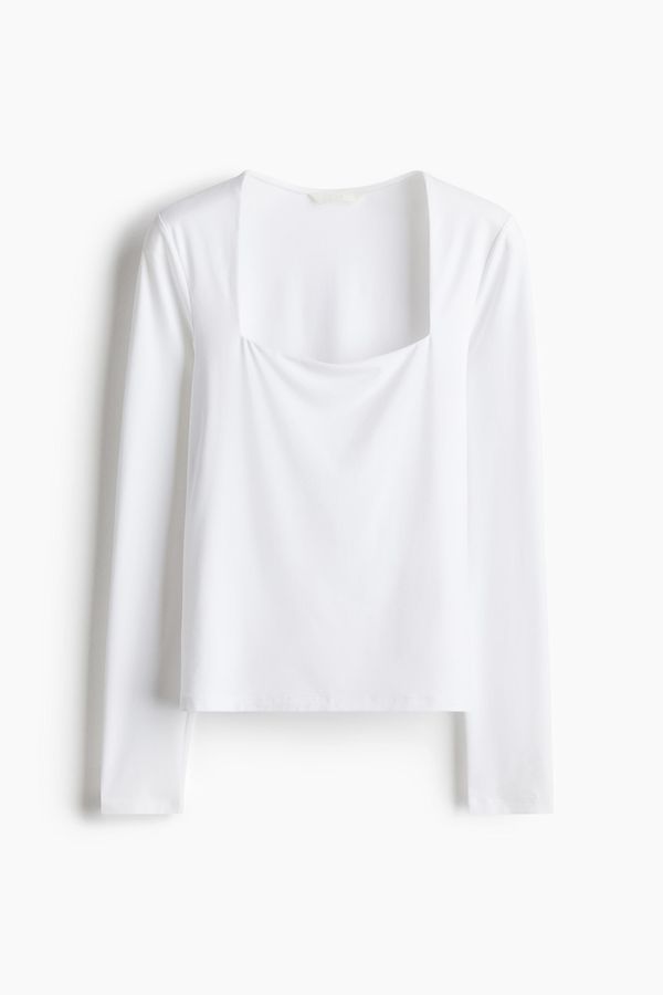 Blusa de mangas largas