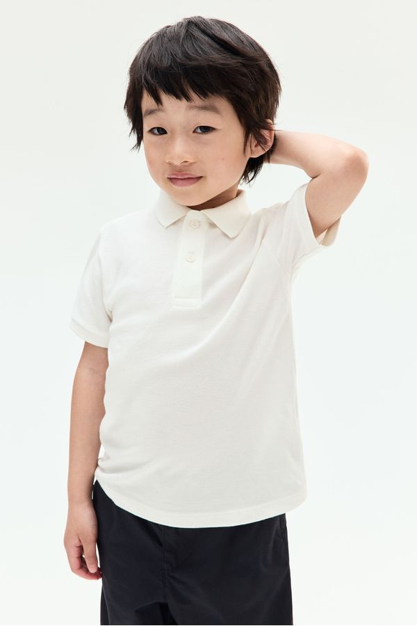 Camiseta estilo polo en piqué de algodón