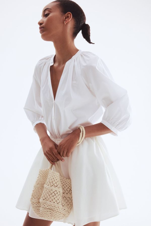 Blusa de popelina con mangas globo