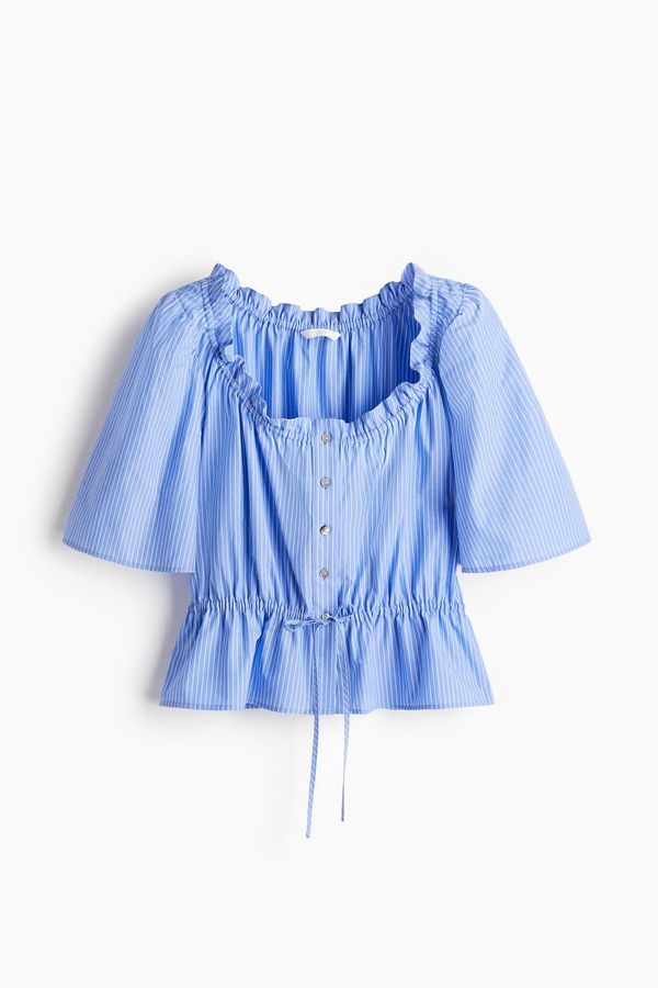 Blusa de algodón con ribetes de volante
