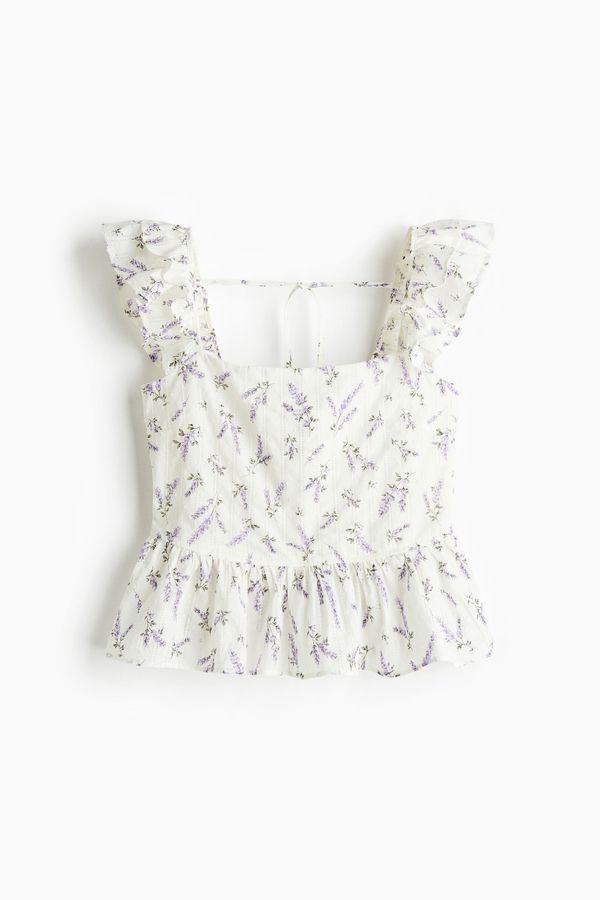 Blusa con lazada y peplum