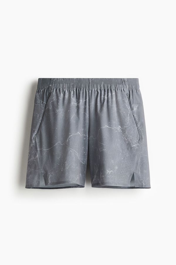 Pantalón corto a media pierna con DryMove™