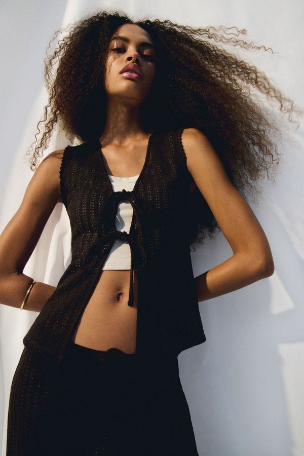 Blusa en tejido de punto con tiras de anudar