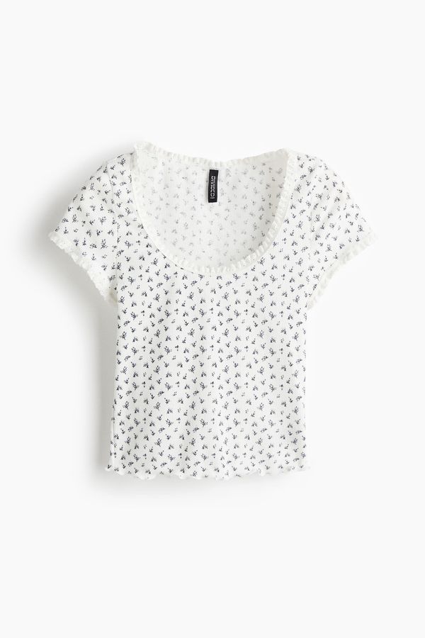 Blusa con ribete de encaje