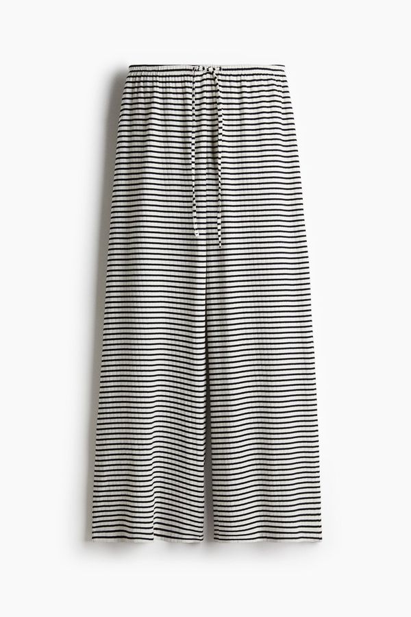 Pantalón en punto acanalado con cordón de ajuste
