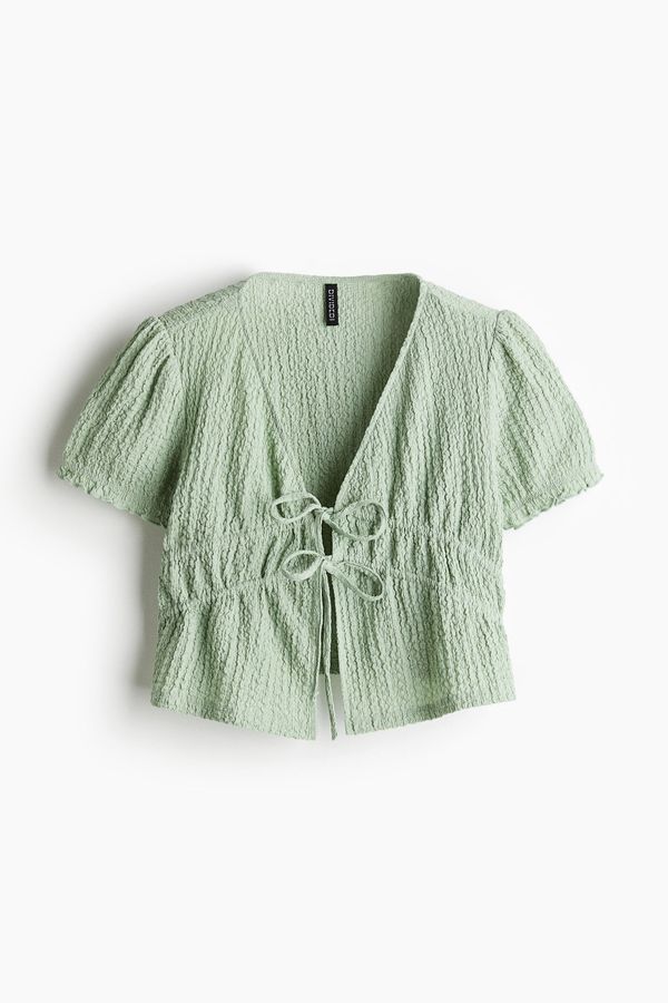 Blusa efecto arrugado con tiras dobles