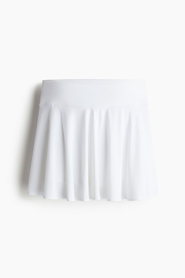 Falda de tenis de corte acampanado con DryMove™
