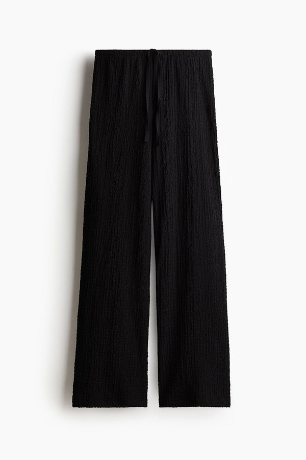 Pantalón efecto arrugado con cordón de ajuste