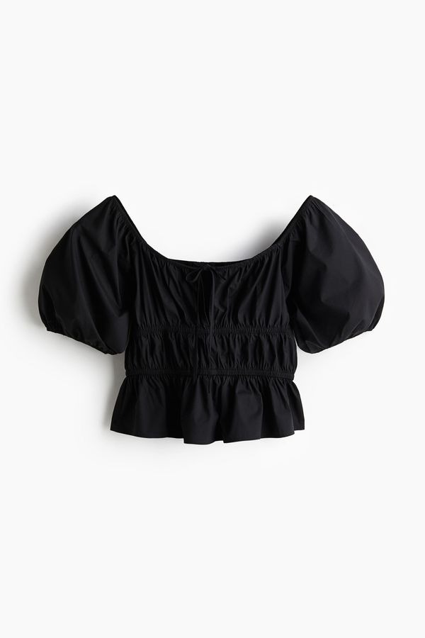Blusa en popelina con mangas globo