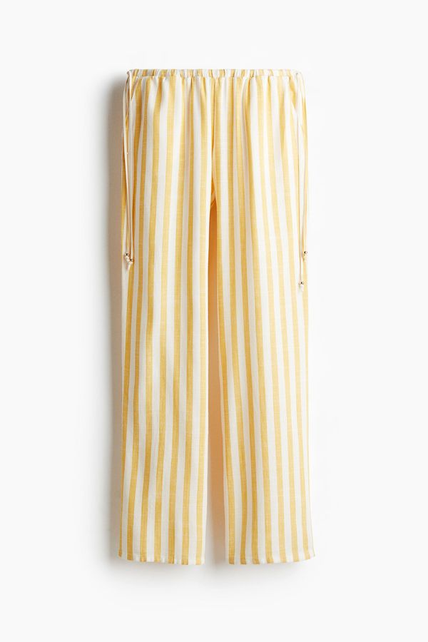 Pantalón ancho con cordón de ajuste