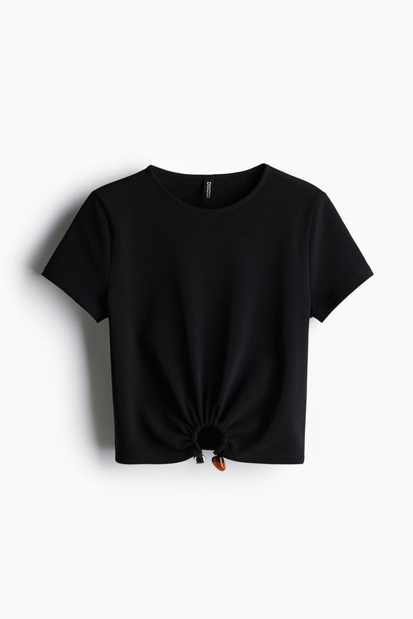Camiseta en punto acanalado con detalle de cuentas