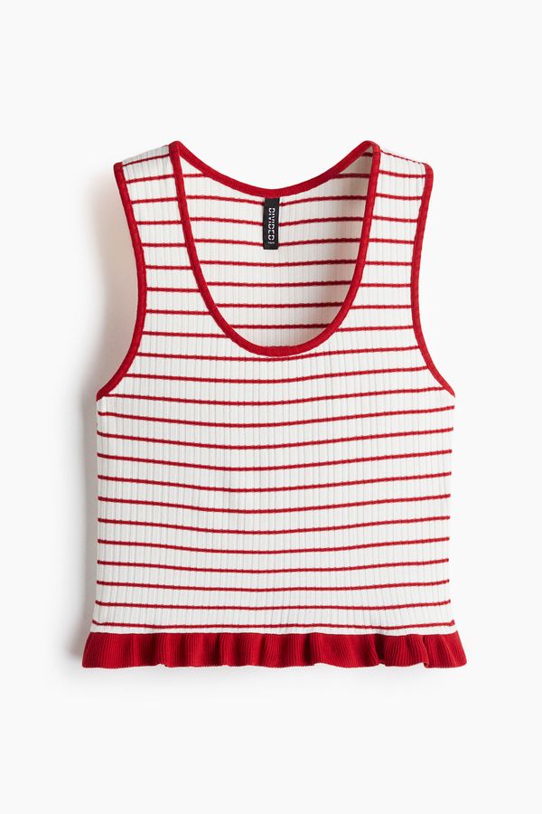 Blusa manga sisa con ribete de volante en el bajo